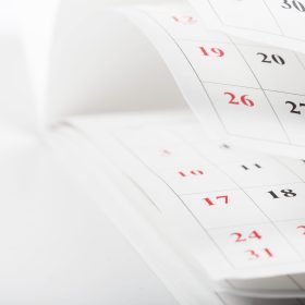 Calendar pages close up business time concept